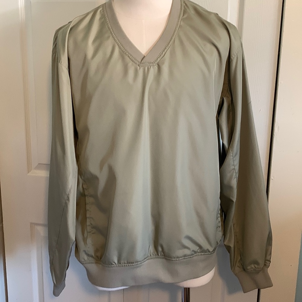 Mens nylon and polyester v-neck pullover.
